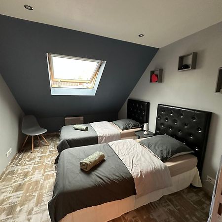 Loc'Apparts Beaumont-sur-Oise Экстерьер фото